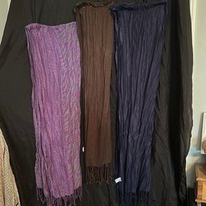 Lot of three long scarves  with fringes.